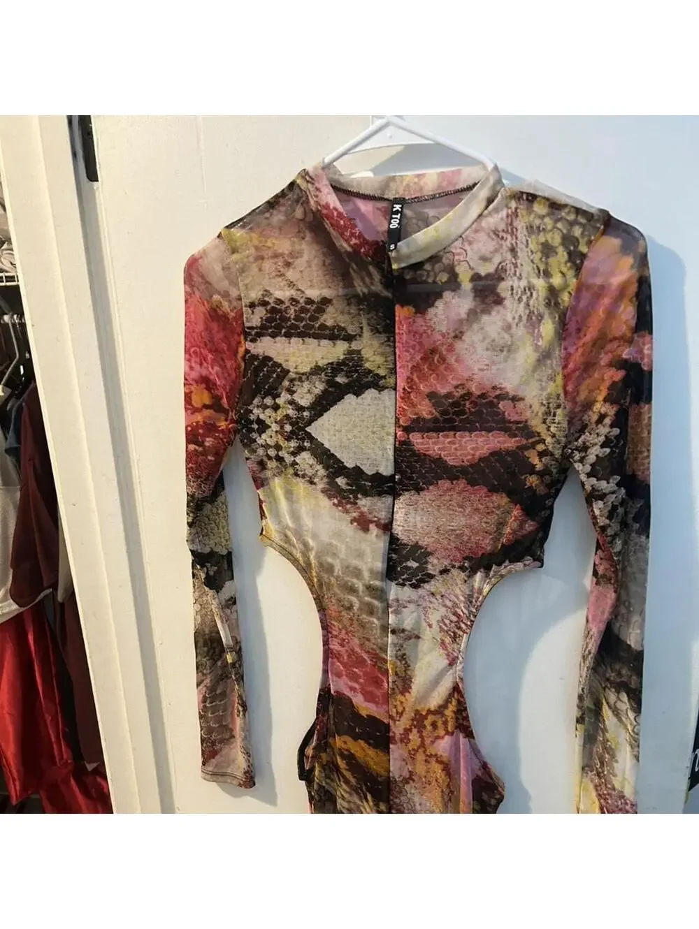 KToo multi-colored snakeskin print mesh jumpsuit with zipper and cut out hips